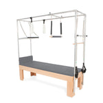 Elina Pilates Cadillac with Adjustable Anodized Aluminum Bar showcasing its durable double mat surface and design versatility.
