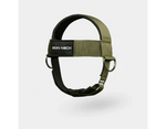 Iron Neck Harness adjustable neck strength training device for enhanced mobility and stability in use with a person performing exercises.