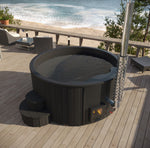 SaunaLife S4 Wood-Fired Hot Tub for 6 showcasing eco-friendly, fast heating, and durable design in a beautiful outdoor setting.