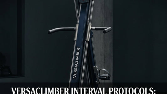 Cinematic editorial shot of a VersaClimber machine in a dark minimalist gym with dramatic overhead lighting