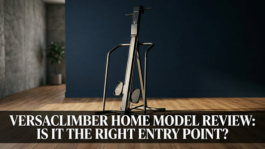VersaClimber Home vertical climber machine in a minimalist navy and wood home gym, cinematic studio lighting