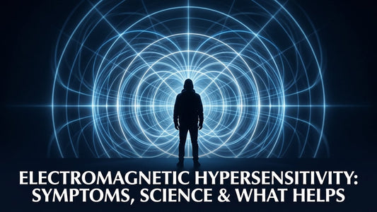 Silhouetted human figure surrounded by glowing electromagnetic field wave rings on dark navy background
