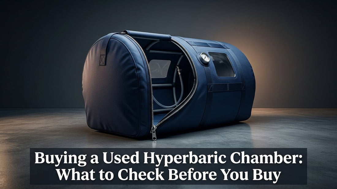 Premium portable hyperbaric chamber with open zipper entry in minimalist clinical setting with dramatic studio lighting