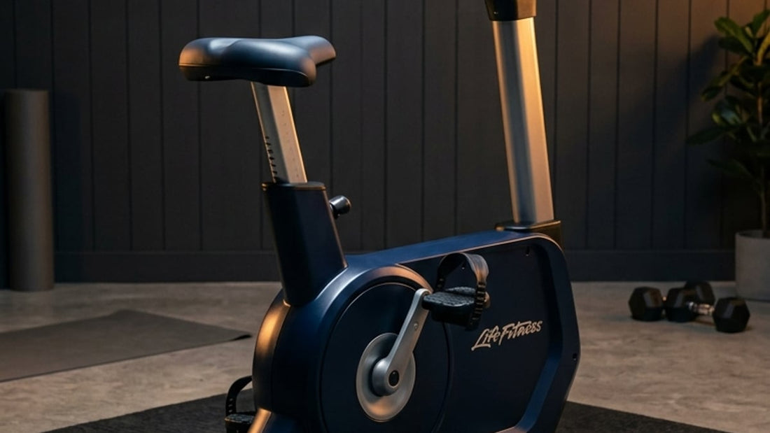Life Fitness Atmos Upright Bike in a minimalist home gym with cinematic studio lighting and brand title text
