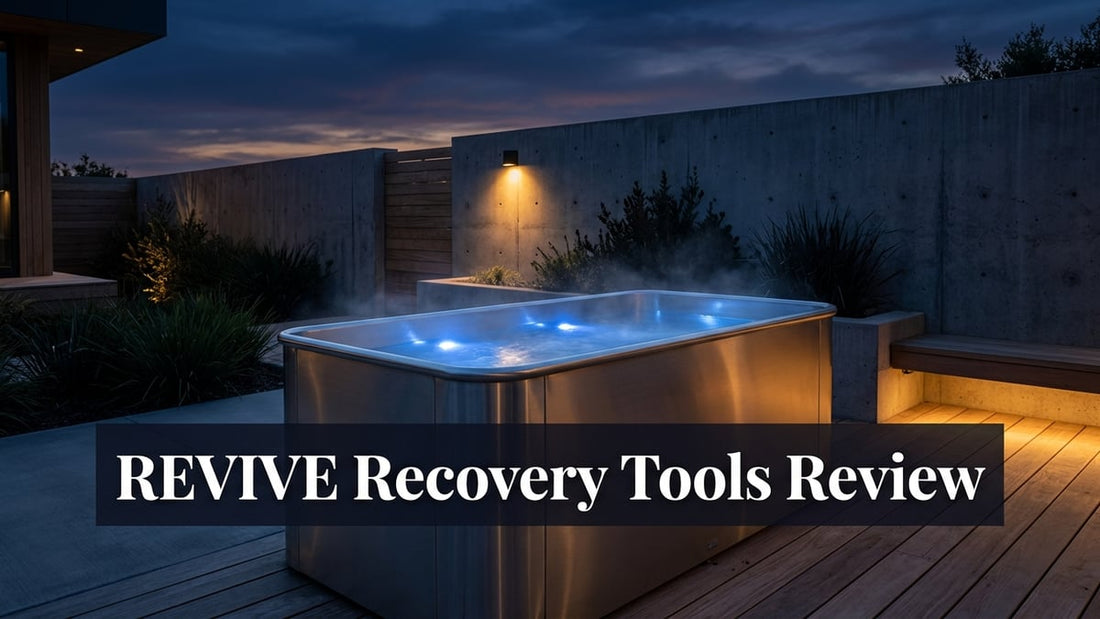 Cinematic shot of a premium stainless steel Revive cold plunge tub on a minimalist outdoor patio at dusk