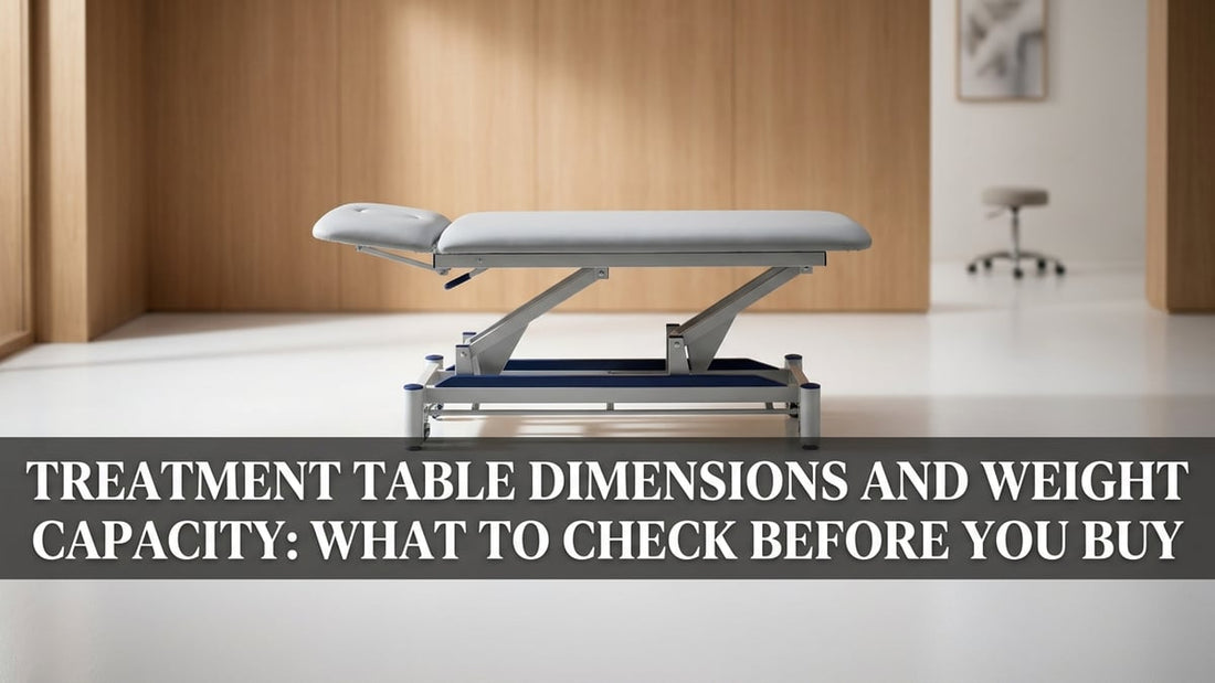 Professional electric hi-lo treatment table in a clean minimalist clinical room with soft directional lighting