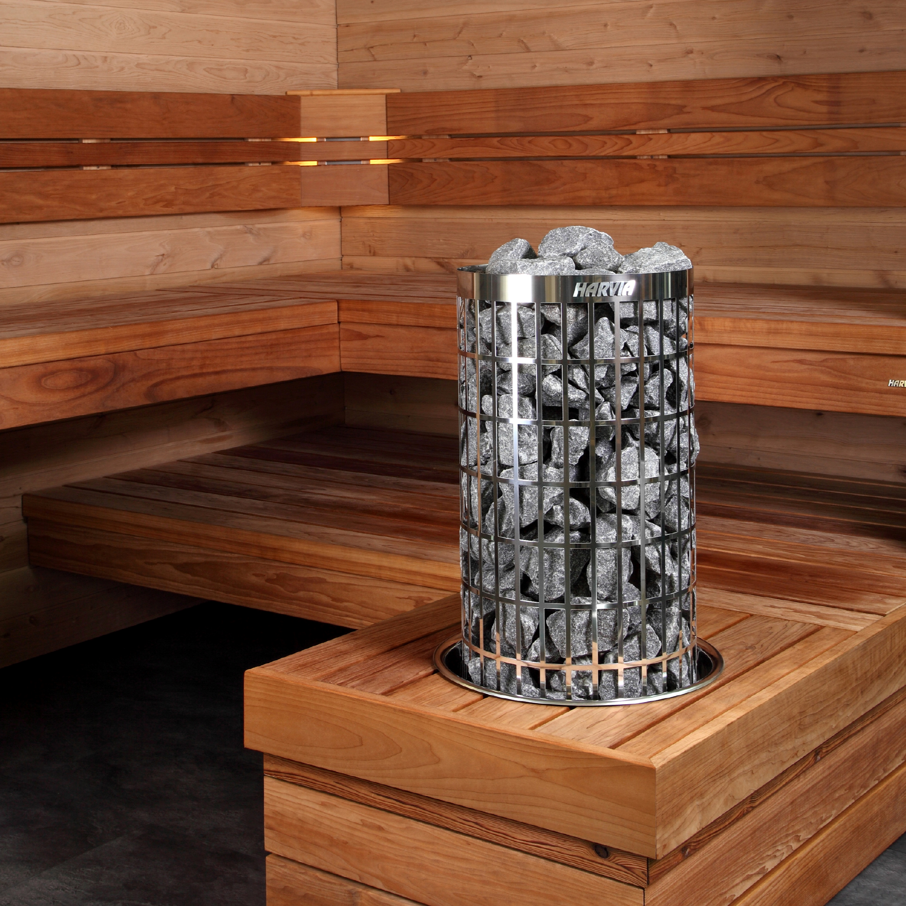 Harvia Cilindro PC60E Sauna Heater 6kW installed in a sauna, highlighting its sleek design and modern technology for relaxation and therapeutic benefits.