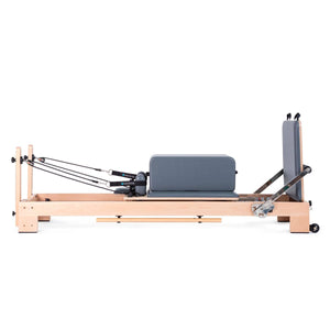 Quiet carriage of Elina Pilates Lignum Reformer Bundle with ergonomic upholstery, perfect for home use and professional studios.
