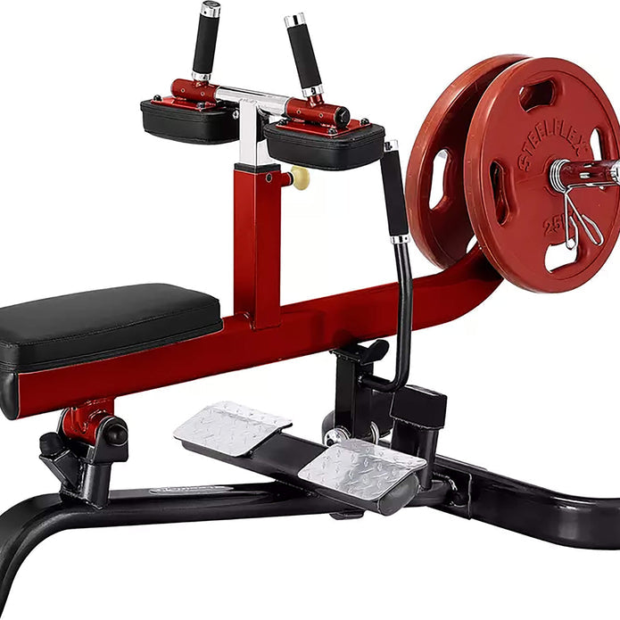 Close-up of the Steelflex PLSC Plate Loaded Seated Calf Machine highlighting the adjustable footplate and padded seat for comfortable workouts.